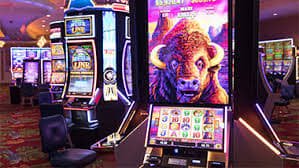 hoki138 slot promotional balance tracker showing wagering progress bar, games contributed, and remaining playthrough amount